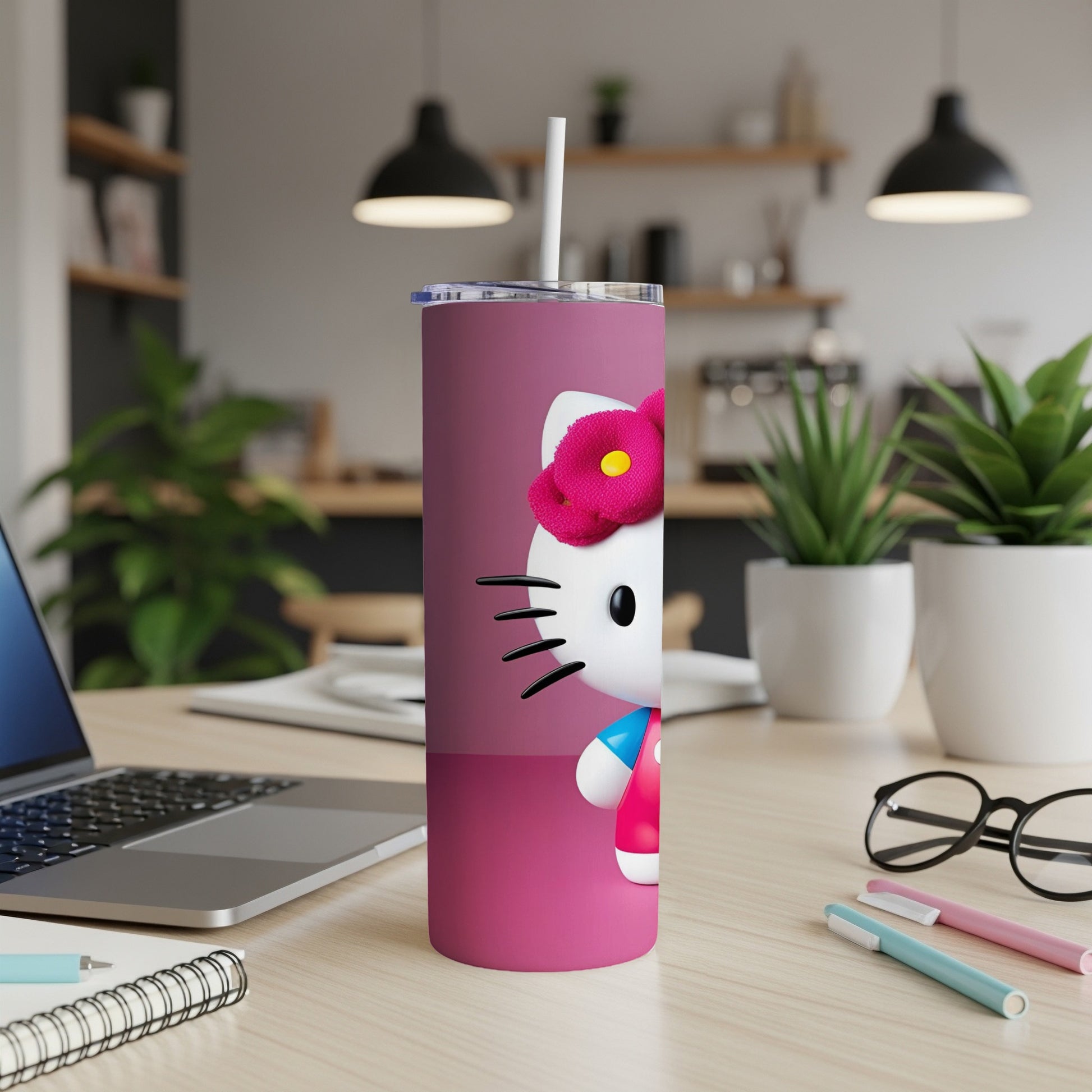 Pink tumbler with Hello Kitty and a red flower bow.