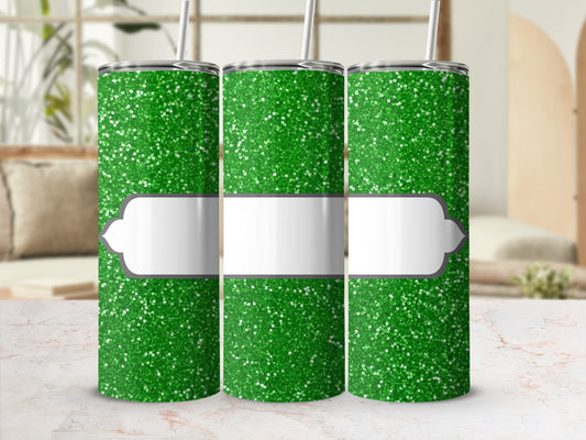 Three green glitter tumblers with blank white labels.