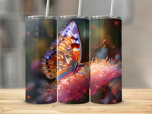 Three tumblers display a close-up of a butterfly on a pink flower.