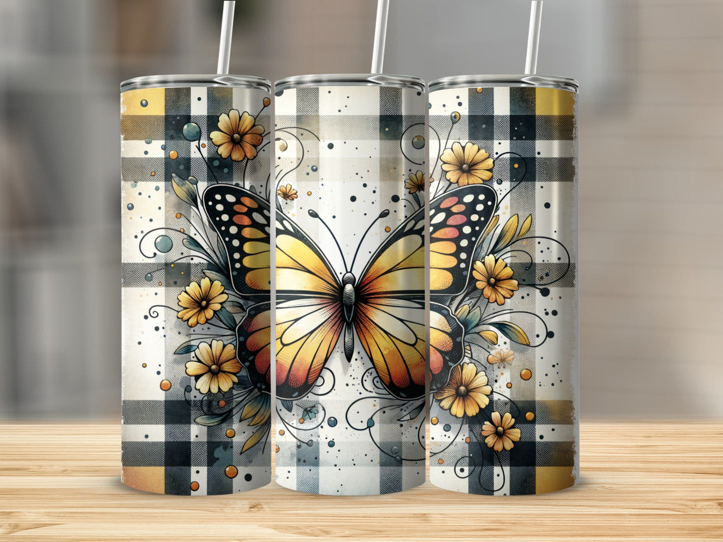 Yellow and orange butterfly with flowers on a plaid tumbler.