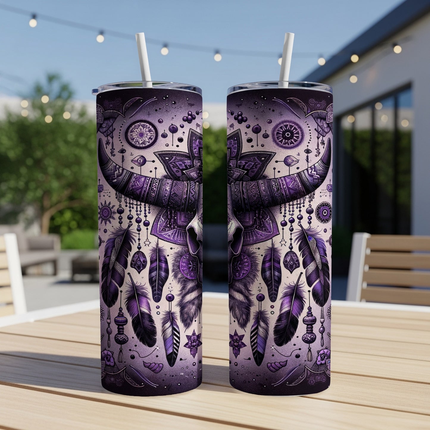 Two purple tumblers with a tribal skull and feather design.