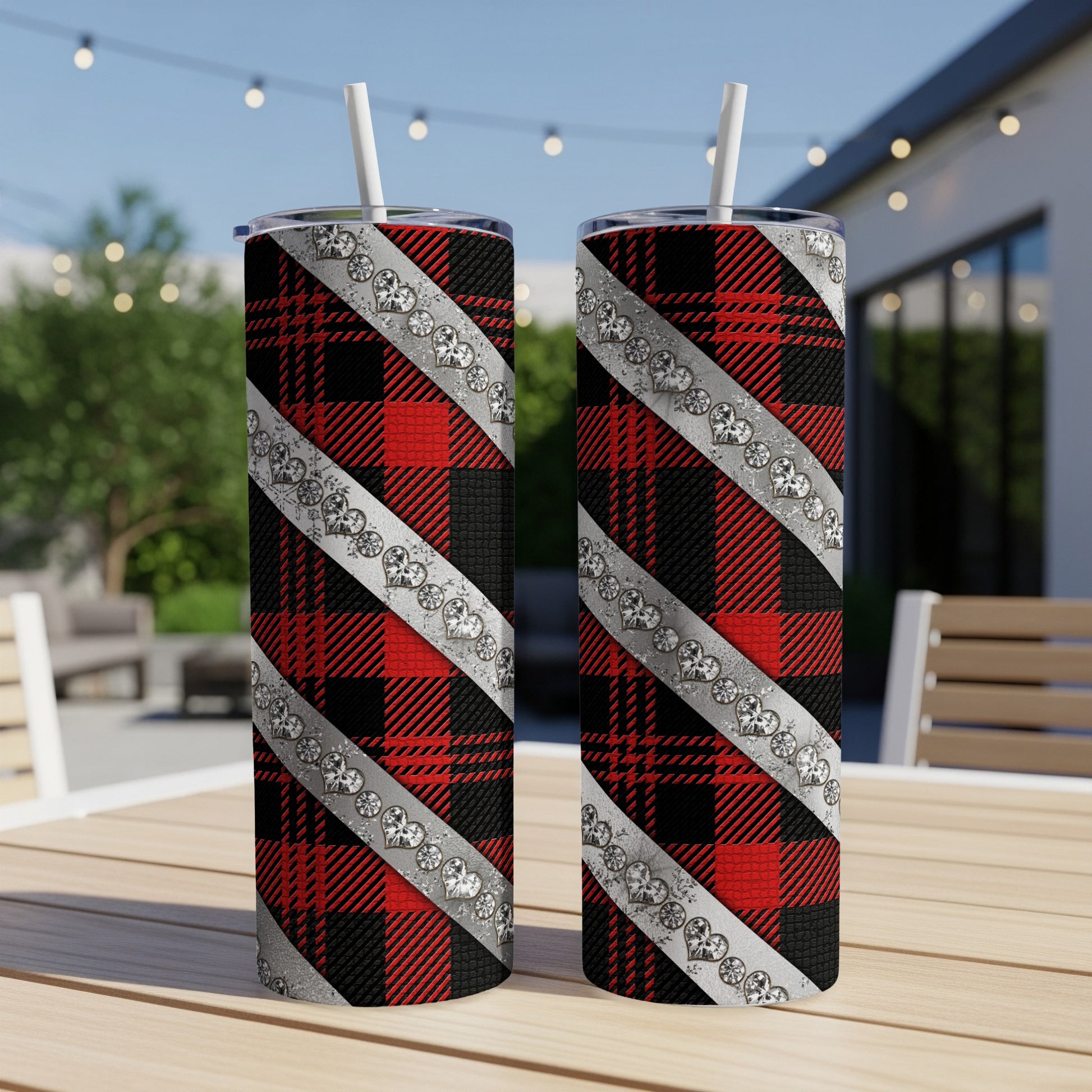 Two tumblers with red and black plaid design and diamond heart accents.