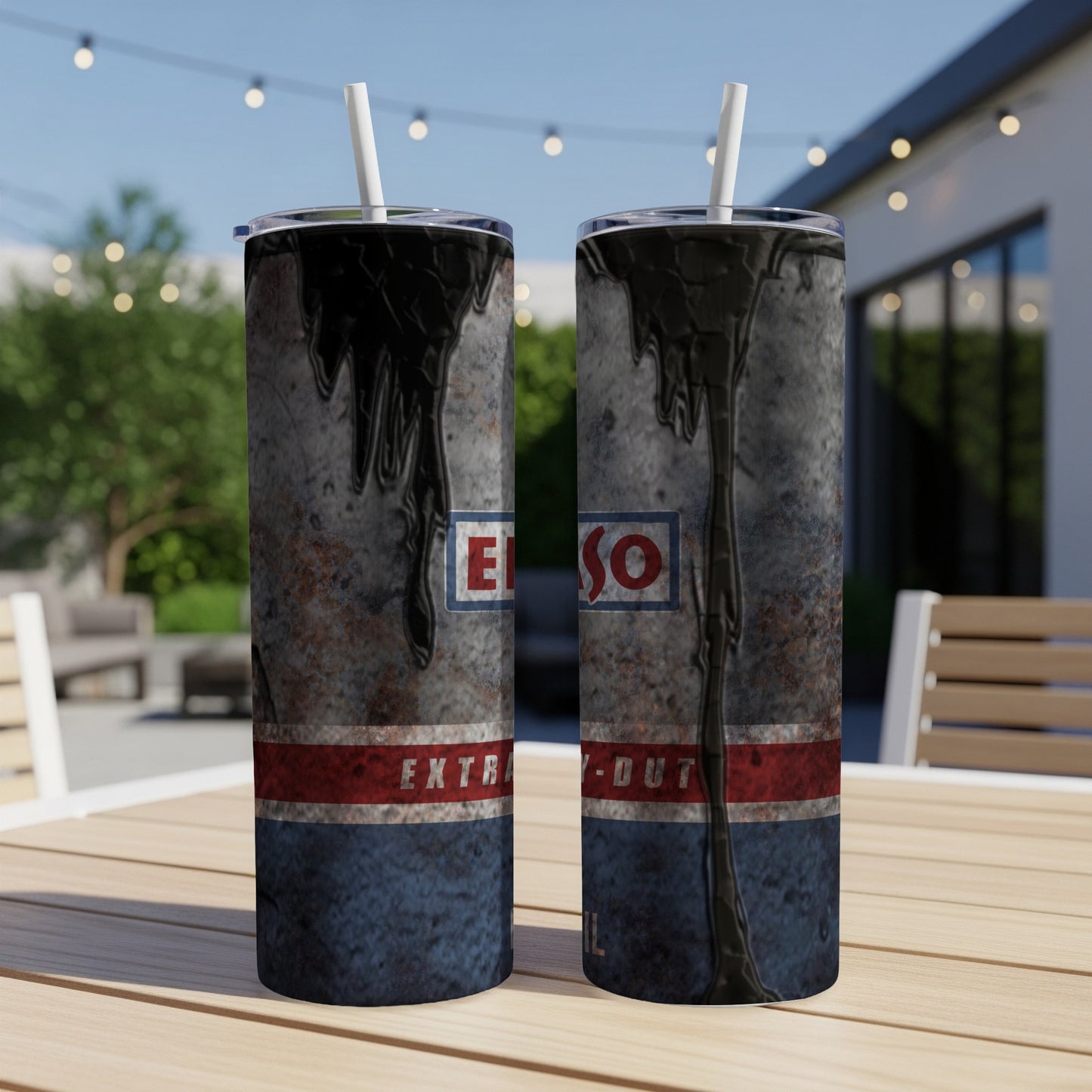 Two tumblers with dripping black oil over Esso Extra logo.