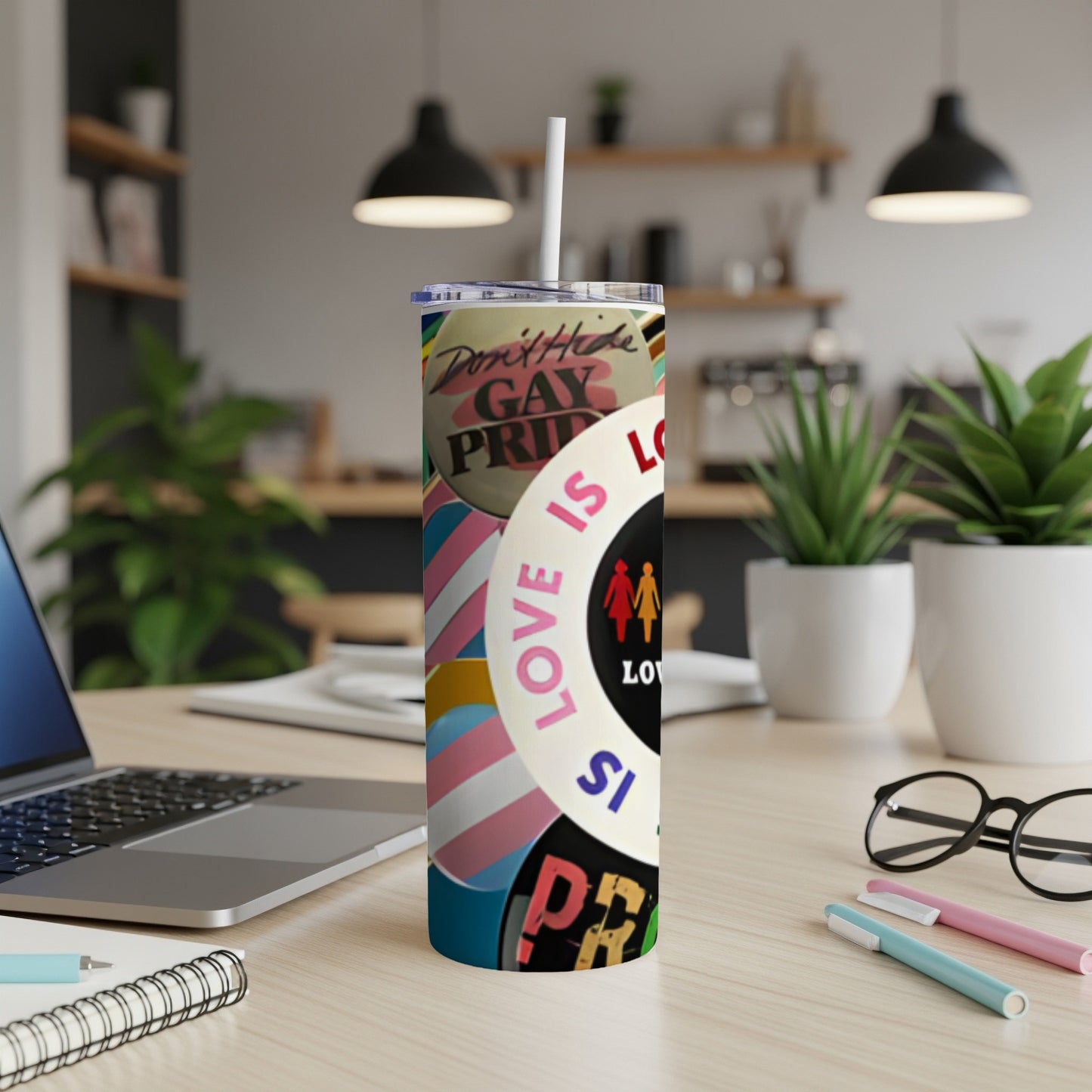 Pride tumbler with "Love is Love" text and rainbow heart symbols.