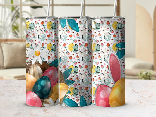 Easter-themed tumbler with eggs, bunnies, and floral patterns.