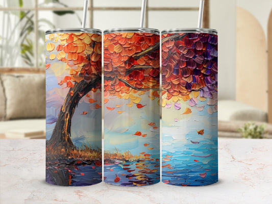 Three tumblers displaying an impressionist painting of an autumn tree with falling leaves.