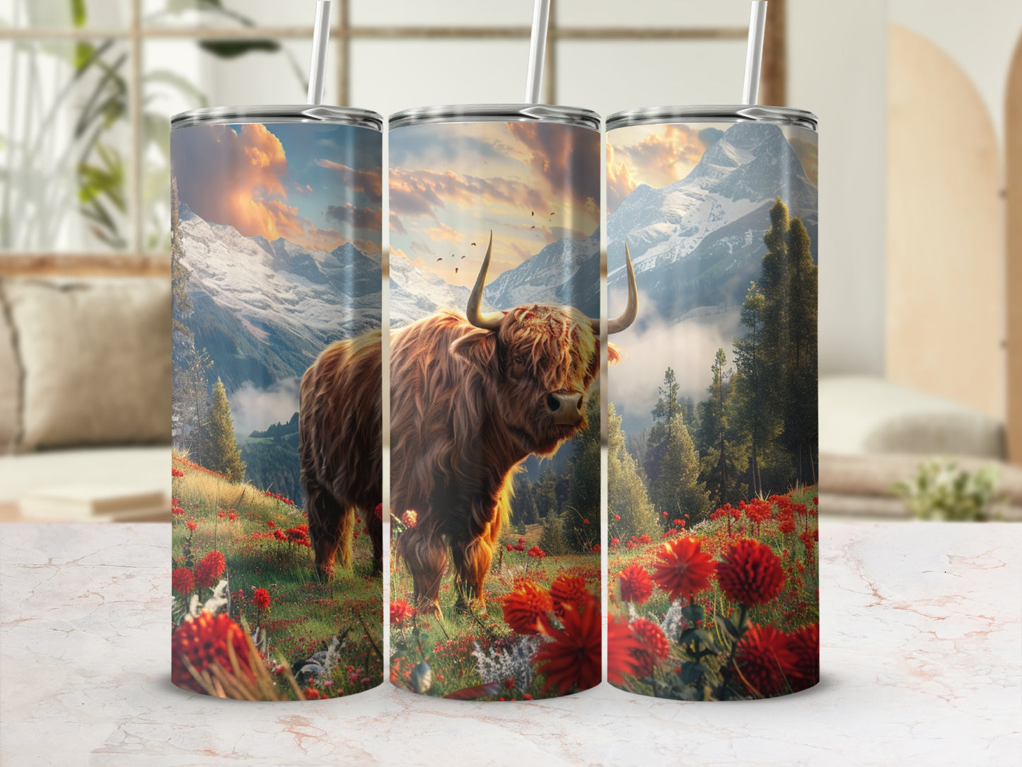 Highland cow in a field of red flowers with mountains in the background.