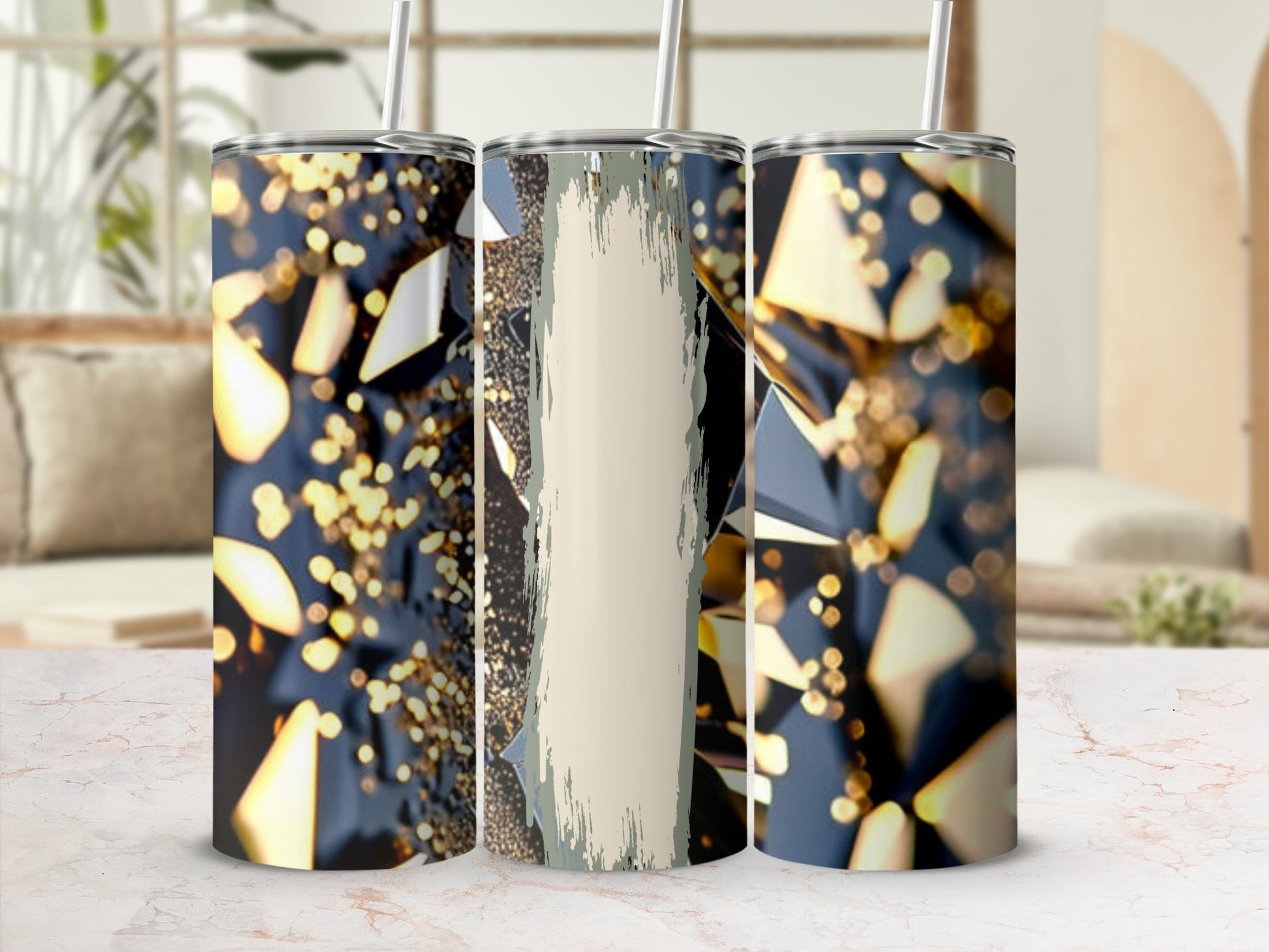 Three tumblers with abstract geometric and glitter designs.