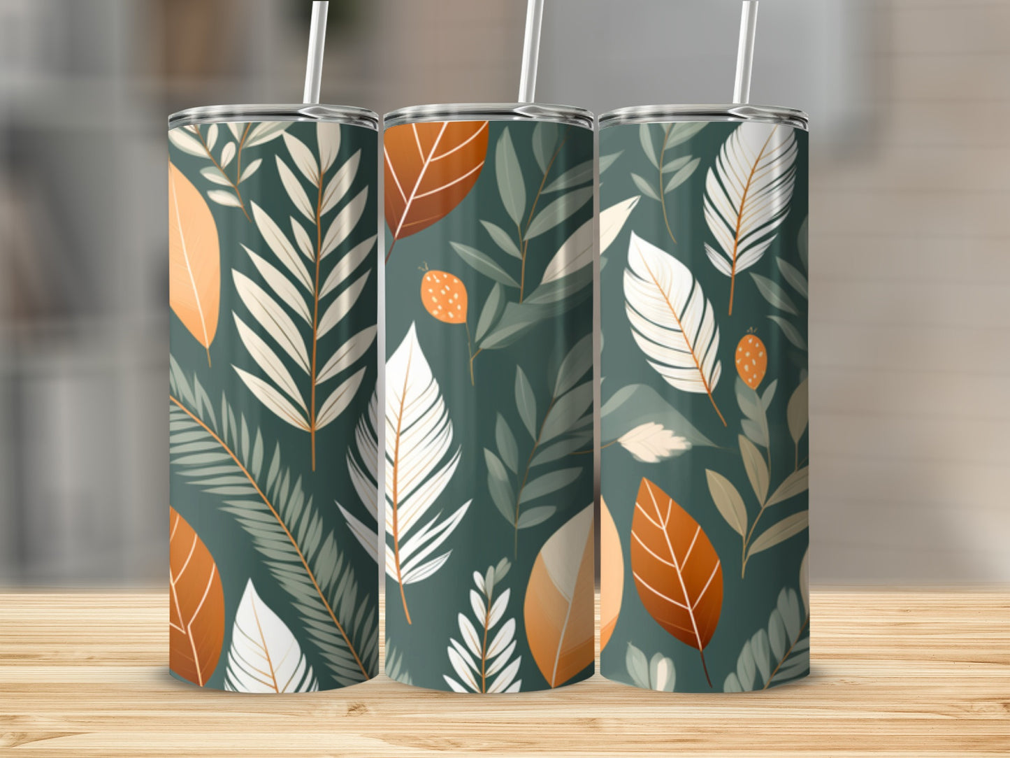 Three tall tumblers with a botanical leaf and berry pattern.