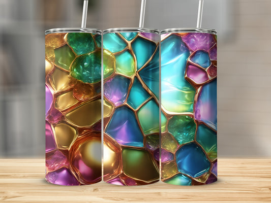 Three tumblers with colorful stained glass and jewel-like patterns.