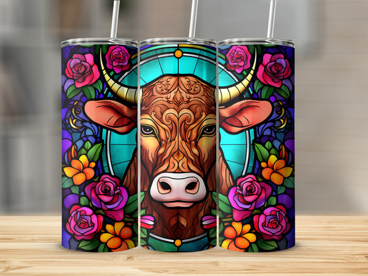 Stained glass bull head with colorful roses and geometric border design.
