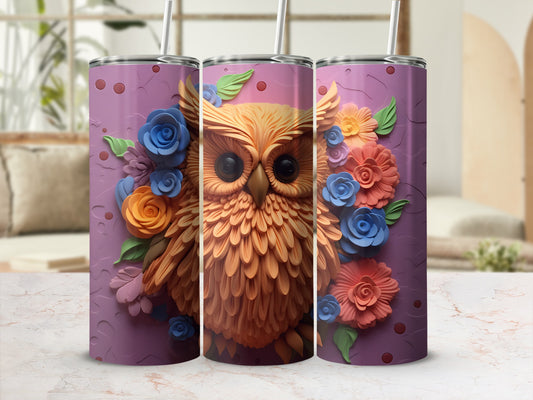 Owl with floral embellishments on a purple textured tumbler.