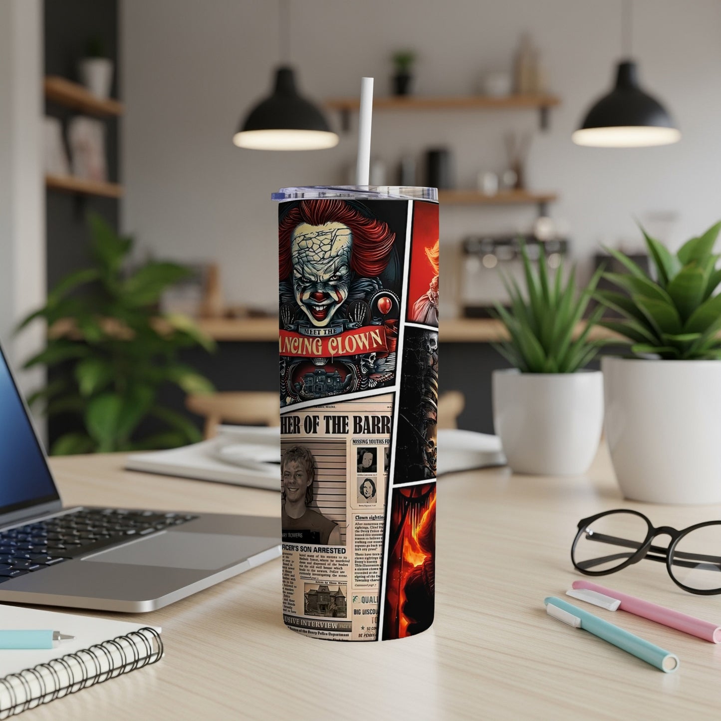 Tumbler with a collage of horror movie images, including a clown and wanted posters.