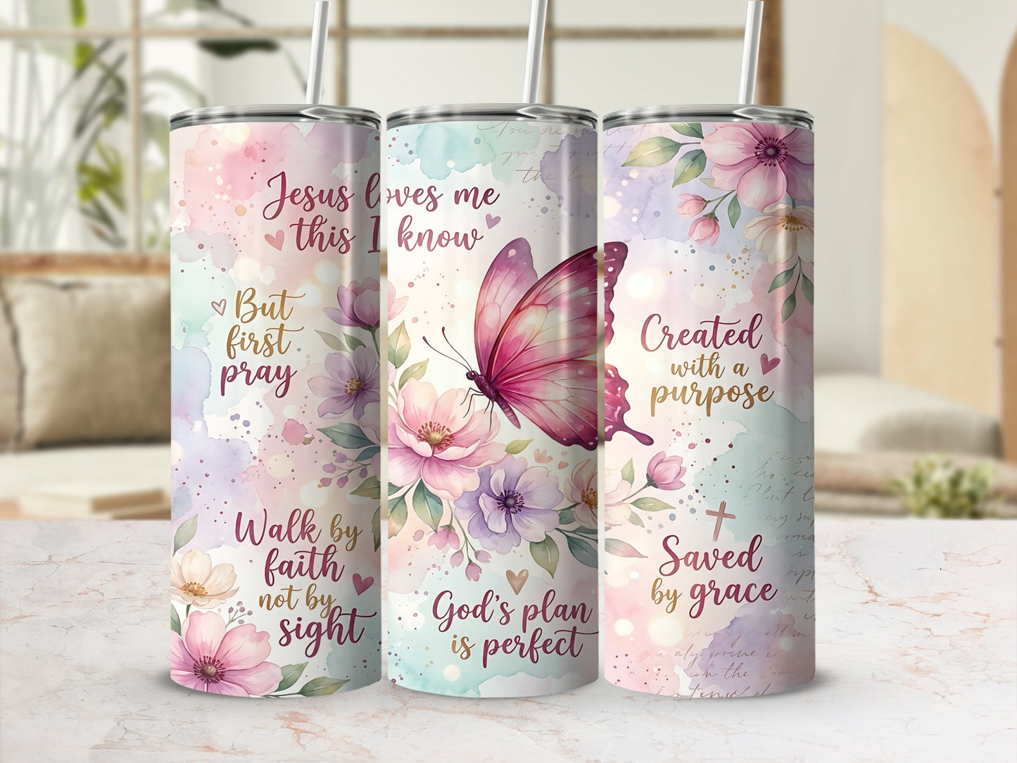 Tumbler with floral and butterfly design and religious quotes.
