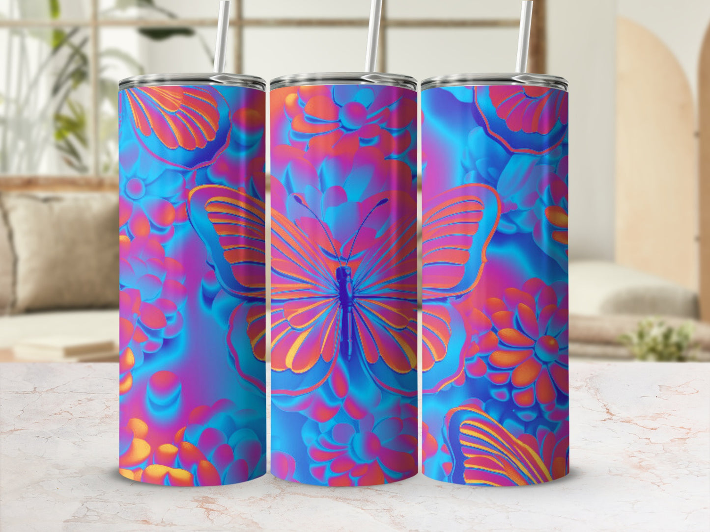 Three tumblers with vibrant butterfly and floral designs.