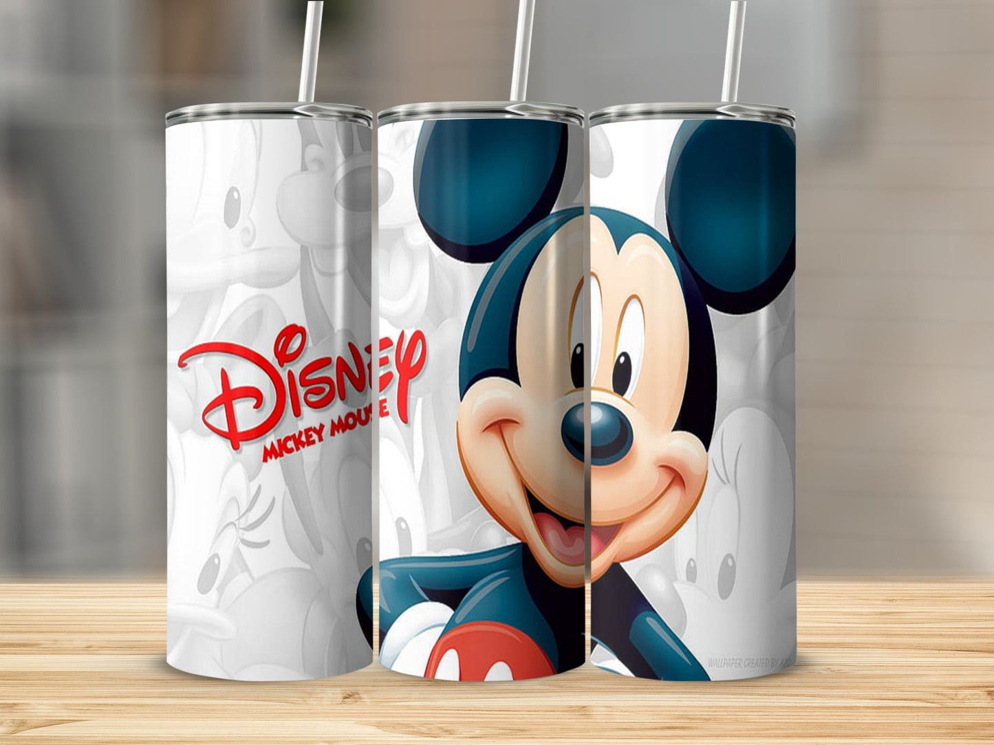 Mickey Mouse in classic red shorts and blue bowtie on a white tumbler.