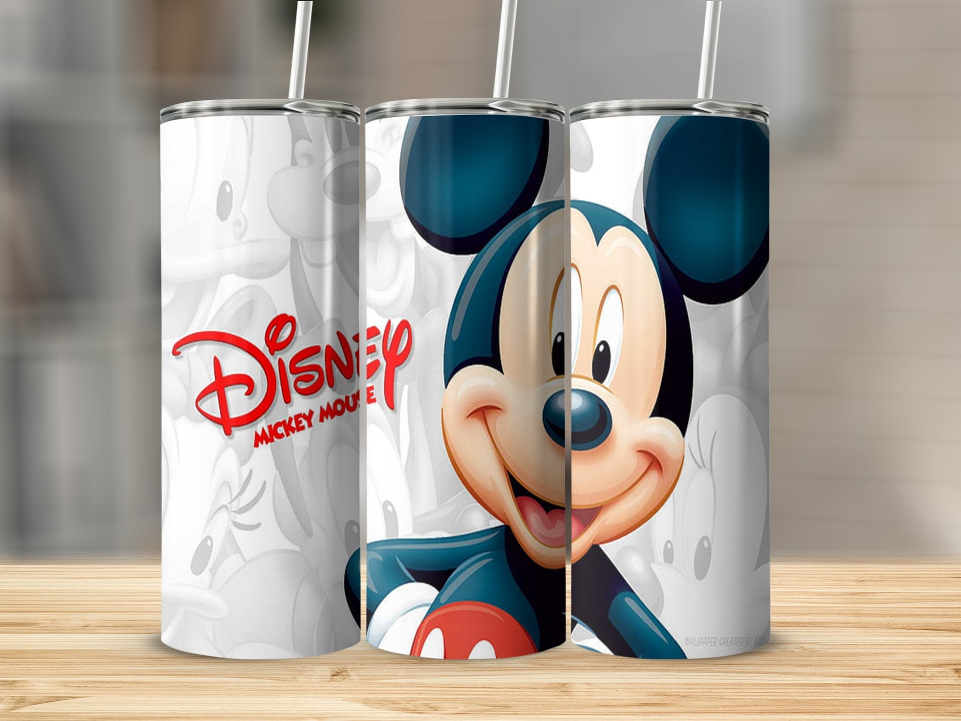 Mickey Mouse in classic red shorts and blue bowtie on a white tumbler.