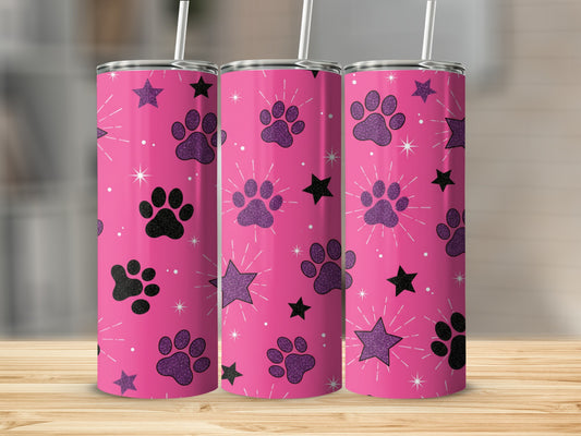 Pink tumbler with black paw prints and sparkly stars pattern.