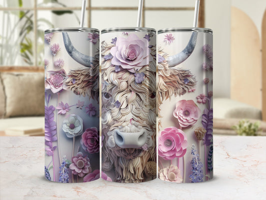 Highland cow with floral accents on a tumbler.