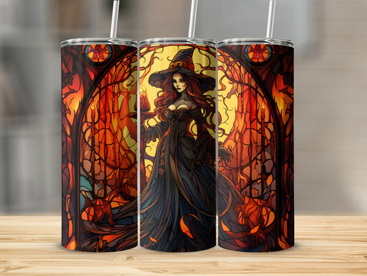 Stained glass witch holding candle against fiery background.