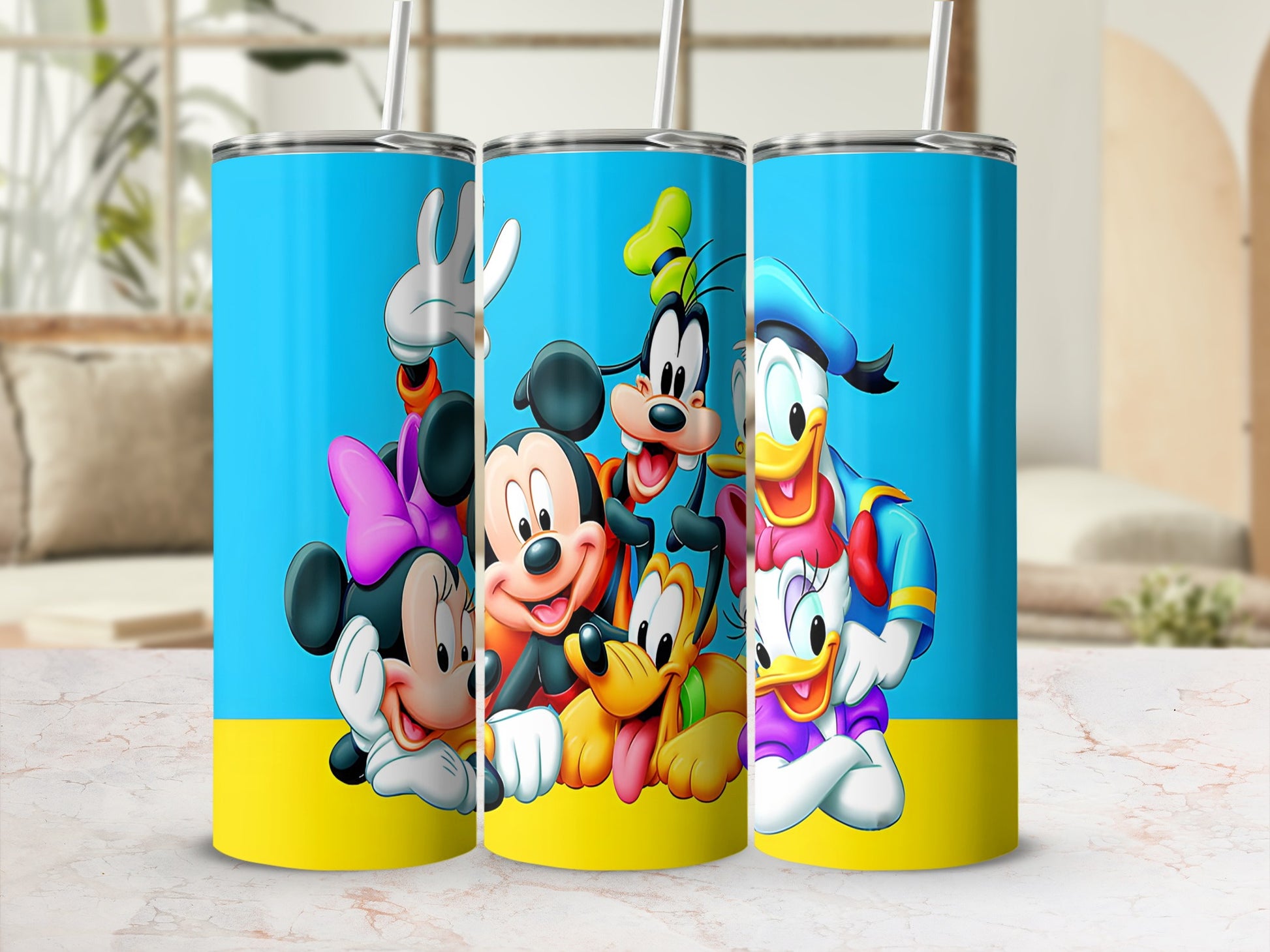 Disney characters Mickey Mouse, Minnie Mouse, Pluto, Goofy, and Donald Duck on a blue and yellow tumbler.