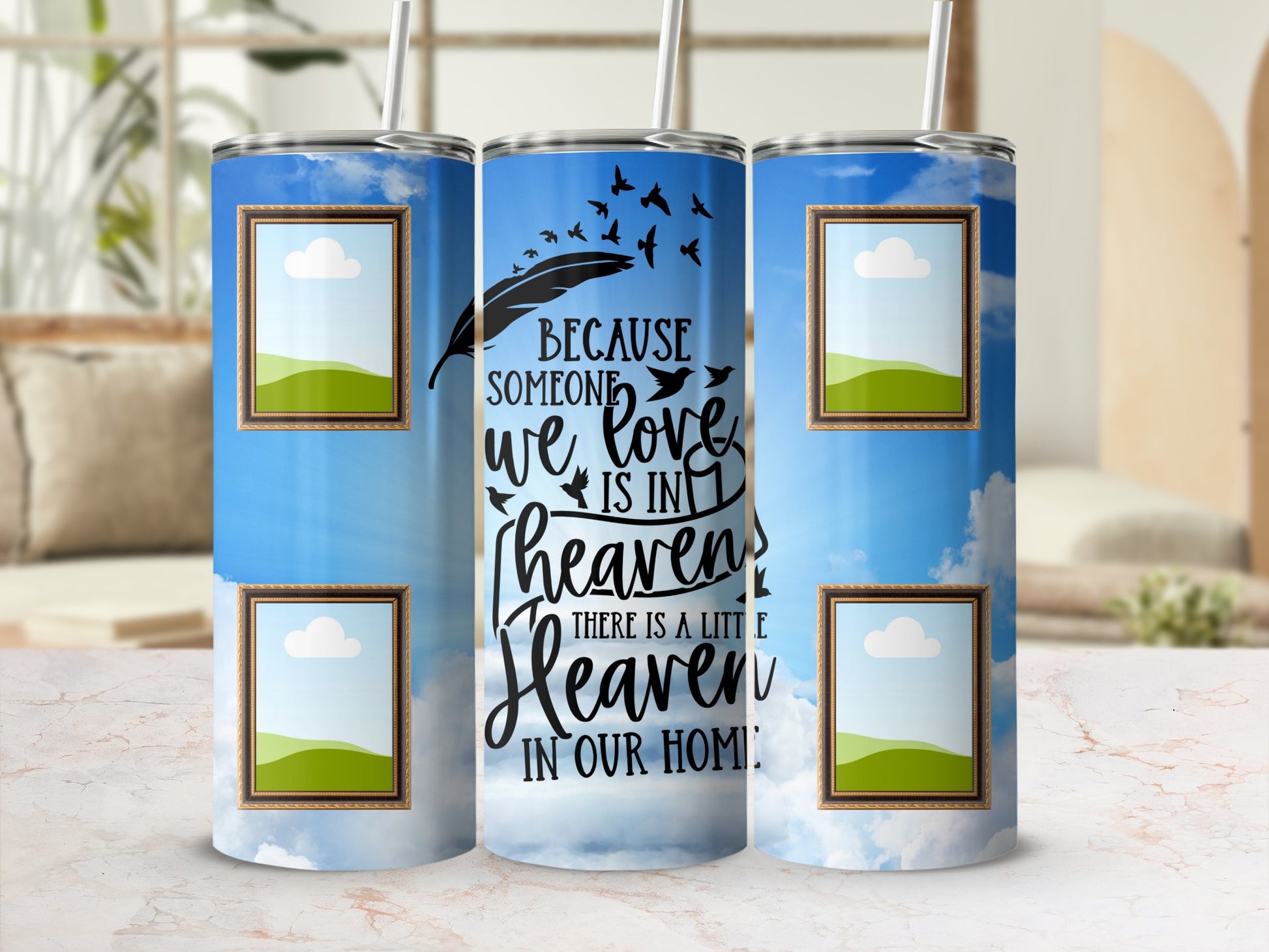 Tumblers with sky design, photo frames, and memorial quote "Because someone we love is in heaven there is a little heaven in our home".