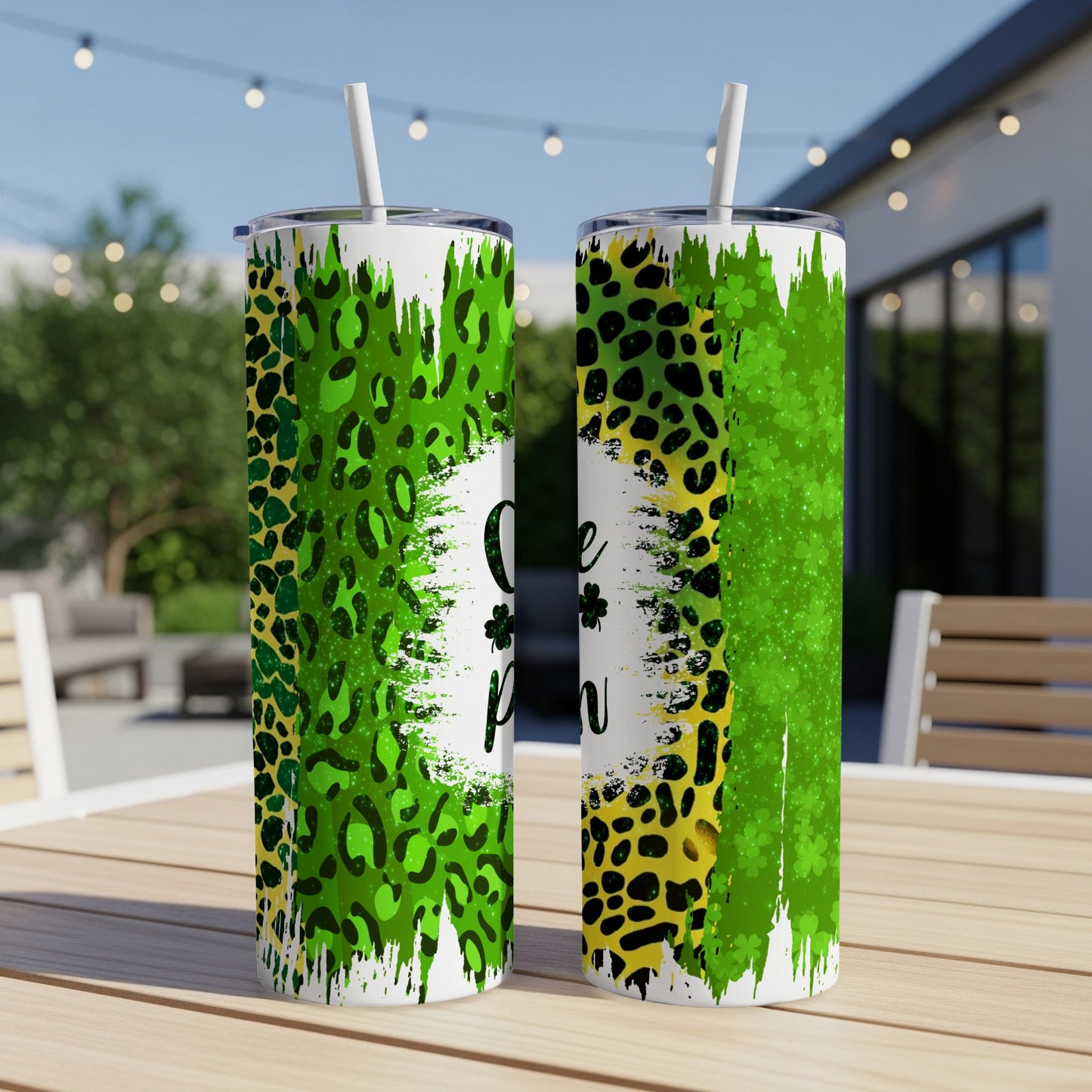 Green leopard print tumbler with "Lucky" text and shamrock.