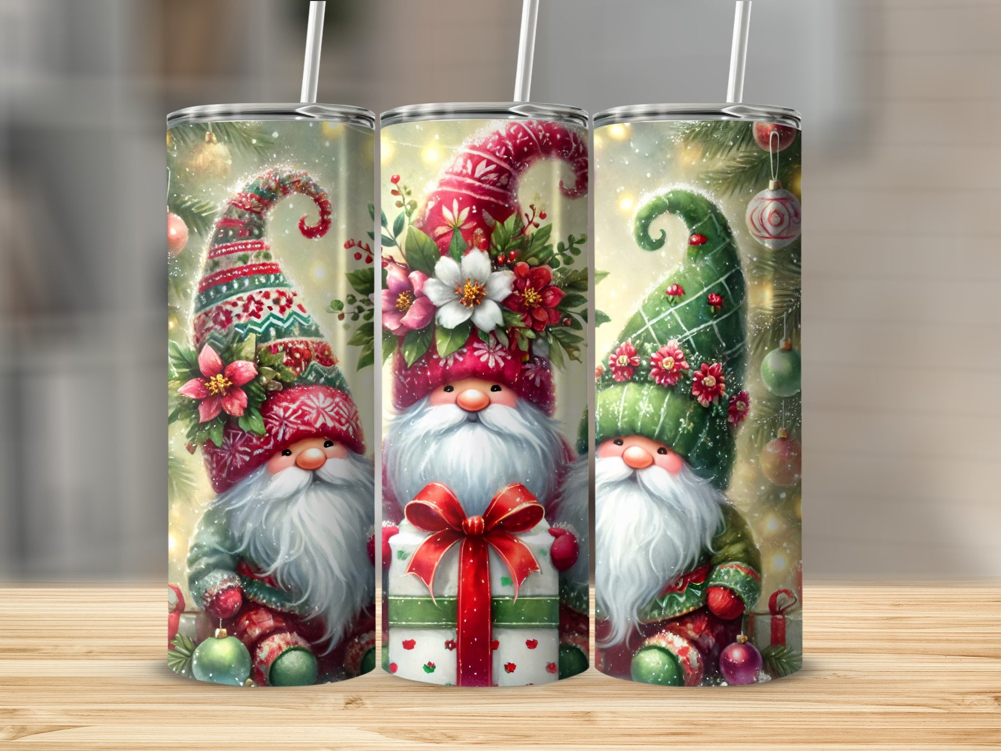 Three Christmas gnomes with gifts and floral decorations on tumblers.