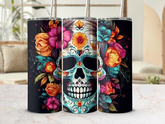 Tumbler with floral skull design, featuring colorful flowers and intricate skull details.