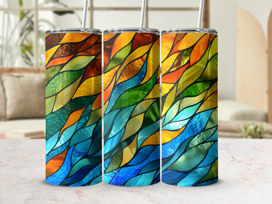 Three tumblers with a stained-glass pattern of blues, greens, and oranges.