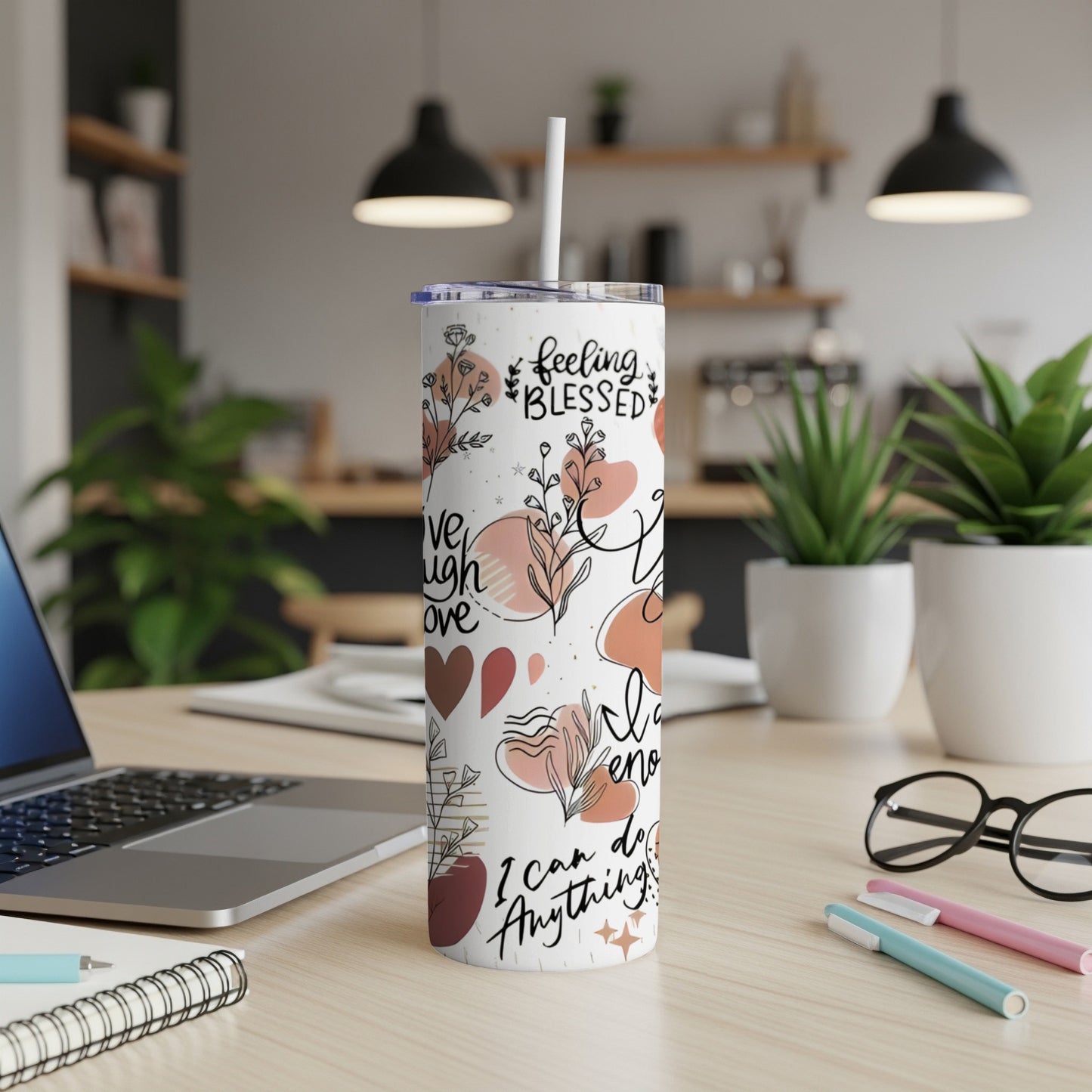 White tumbler with abstract floral design and text "Feeling Blessed I Love You I can do Anything".