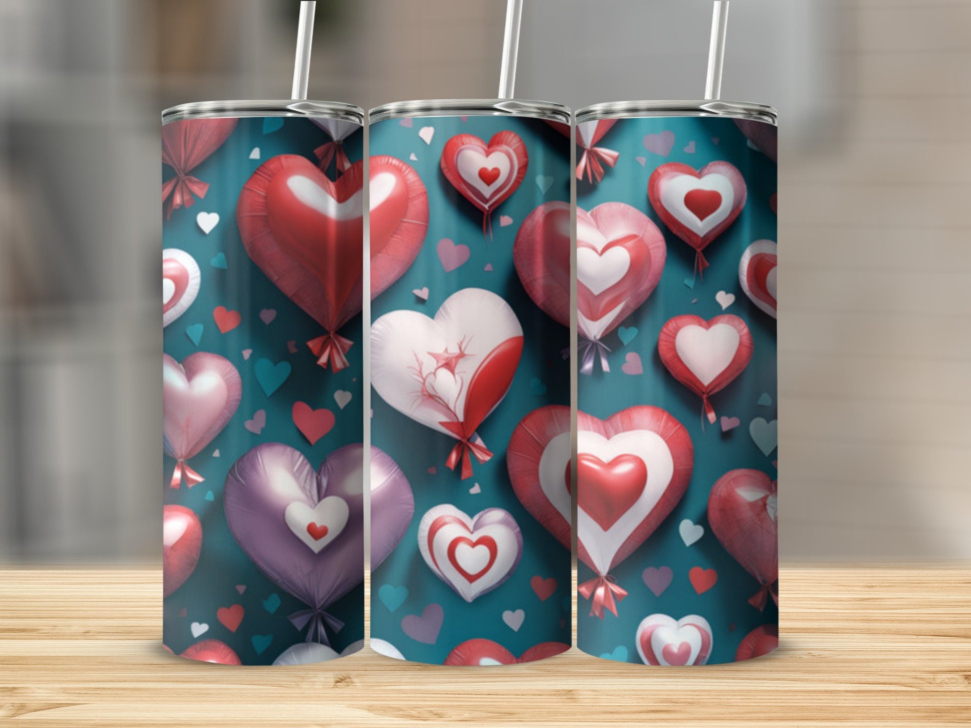 Three tumblers with heart-shaped balloons and small hearts pattern.