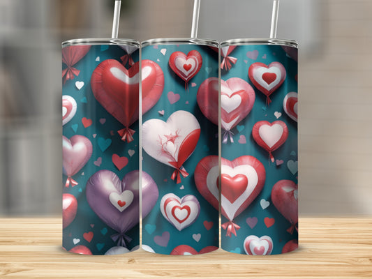 Three tumblers with heart-shaped balloons and small hearts pattern.