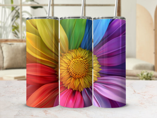 Three tumblers with rainbow flower petal designs arranged side-by-side.