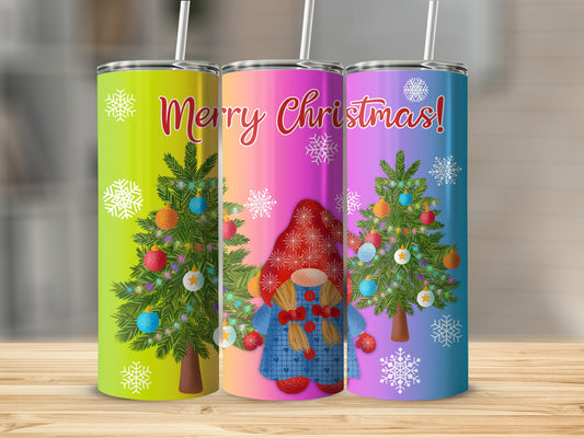 Three Christmas tumblers with gnomes and snowflakes on a wooden surface.