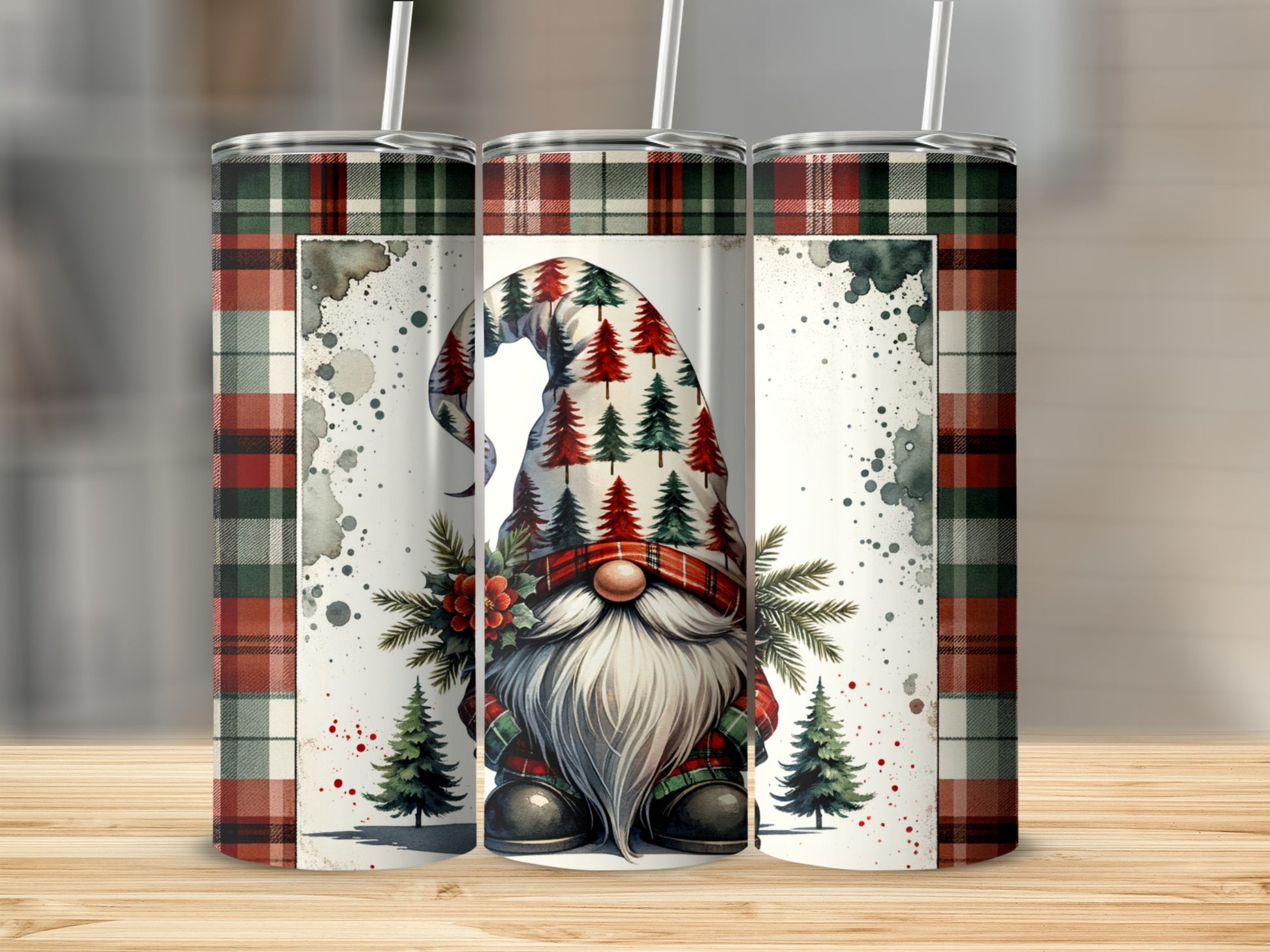 Three skinny tumblers with a gnome and Christmas trees on plaid backgrounds.