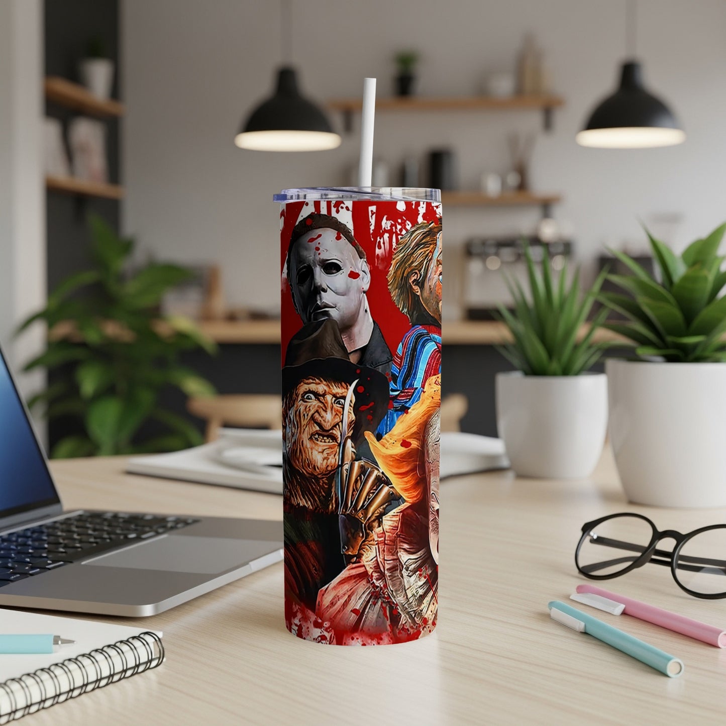 Tumbler with horror movie characters including Freddy Krueger, Michael Myers, and Chucky.