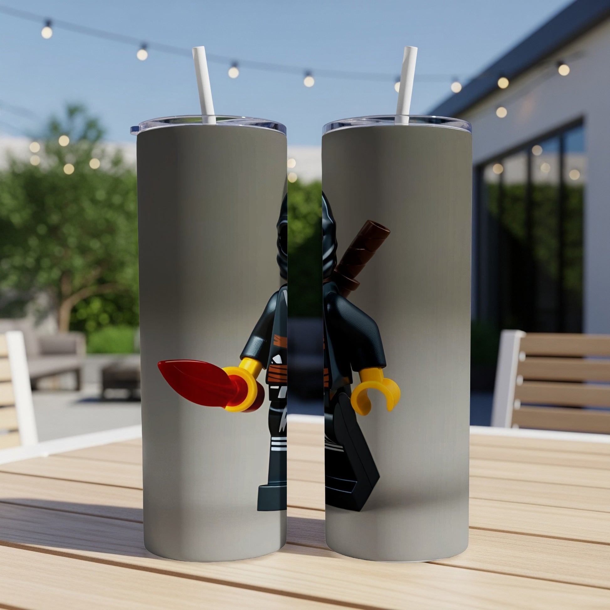 Two Lego ninjago minifigures with swords on tumblers.