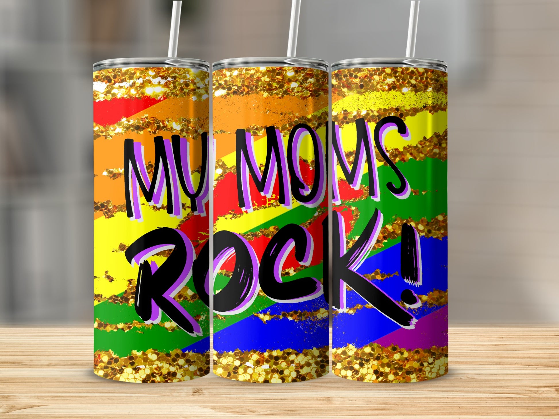 Rainbow glitter tumbler with "My Moms Rock!" text.