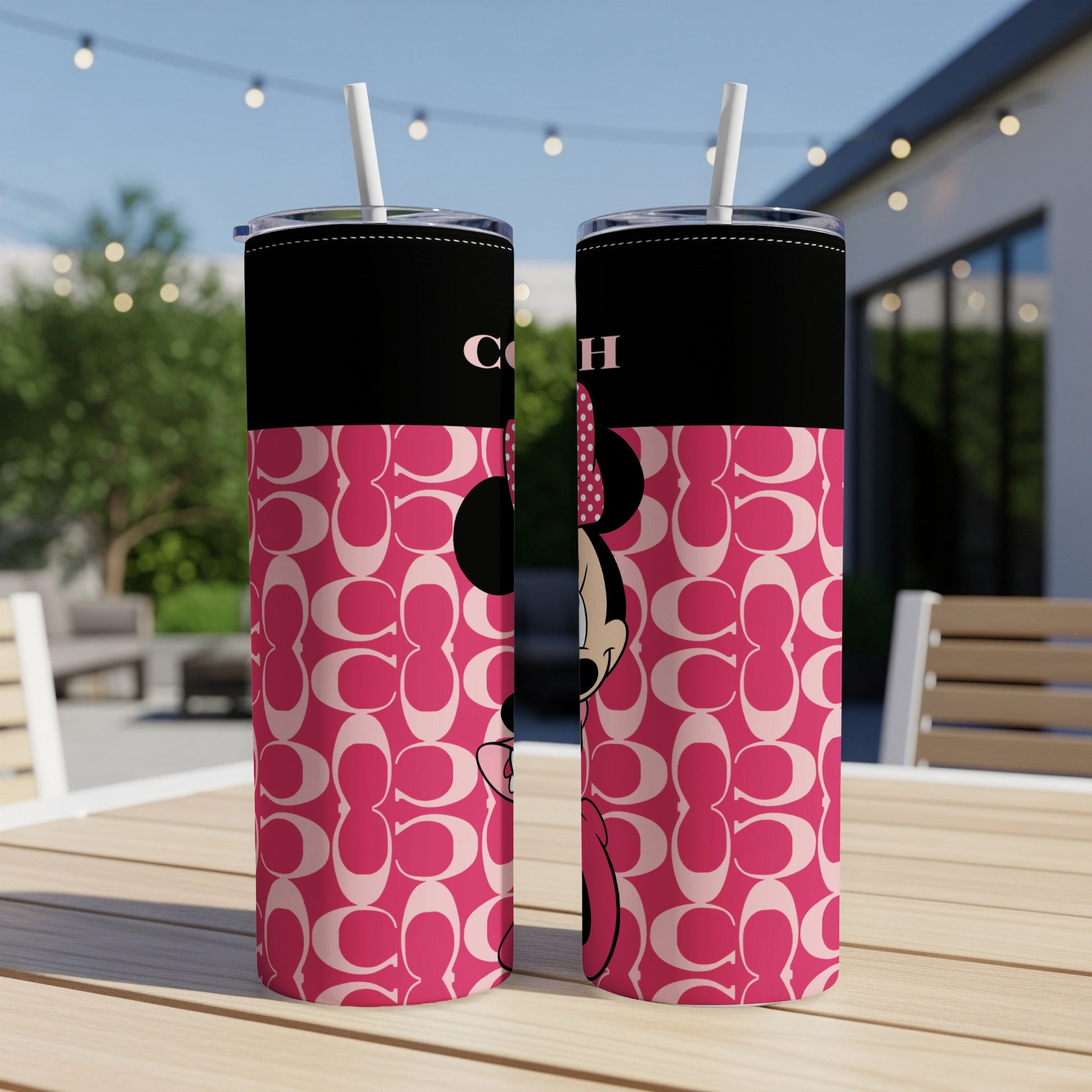 Two tumblers featuring Minnie Mouse and the Coach C logo pattern.