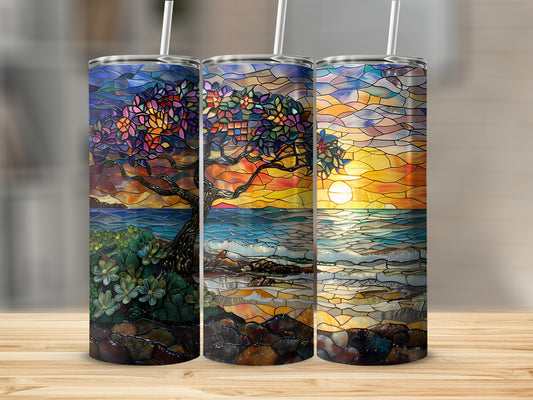 Three stained glass tumblers featuring a sunset seascape and tree.