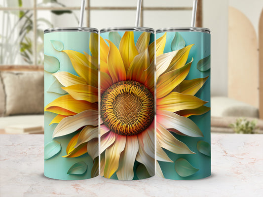 Three tumblers with a close-up sunflower design on a pale blue background.