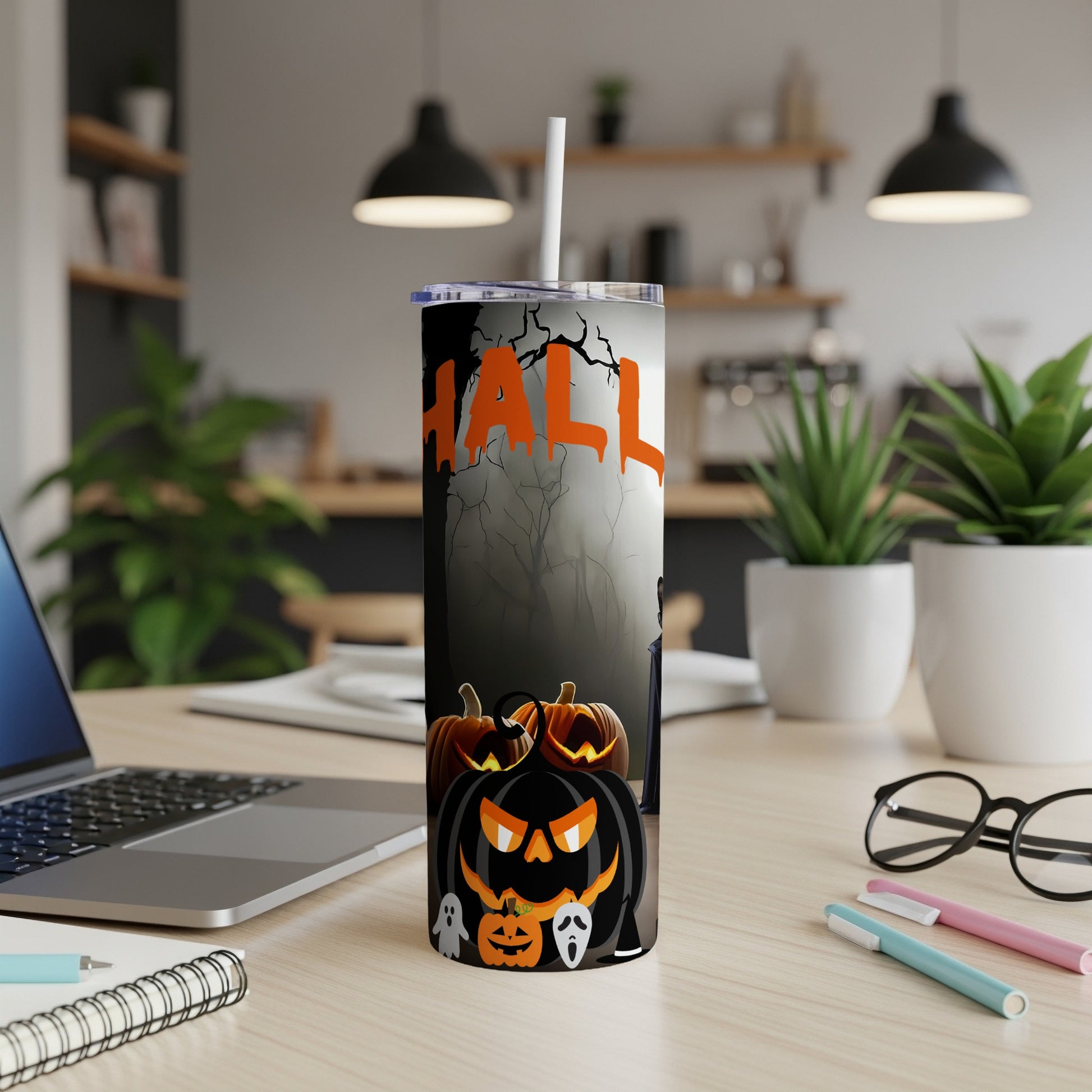 Halloween tumbler with pumpkins, ghosts, and "HALLOWEEN" text.