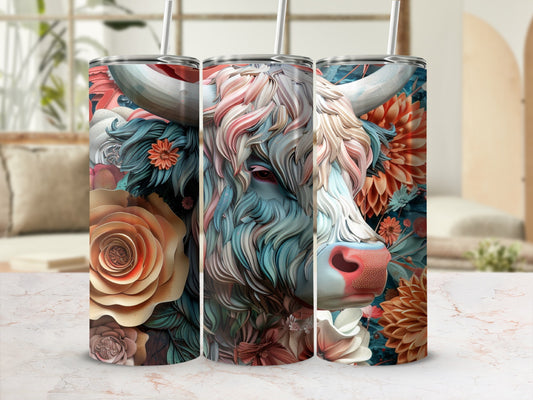 Floral cow design on a tumbler with two straws.