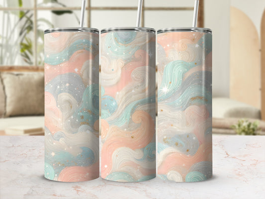 Three tumblers with a swirled pastel pattern of pink, blue, and gold.