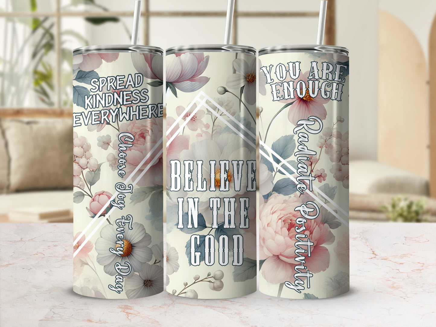 Three floral tumblers with motivational quotes: "Spread Kindness Everywhere," "Believe in the Good," "You Are Enough."