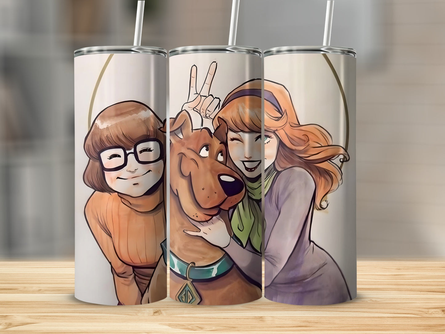 Scooby-Doo characters Velma and Daphne with Scooby-Doo making peace sign.