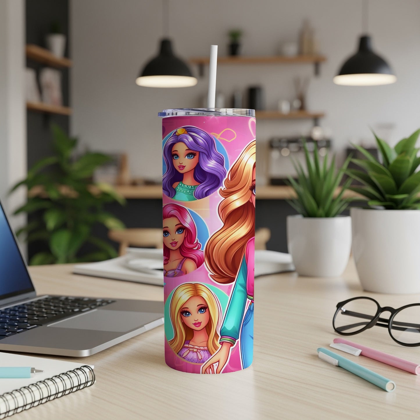 Pink tumbler featuring four Barbie dolls with colorful hair and outfits.