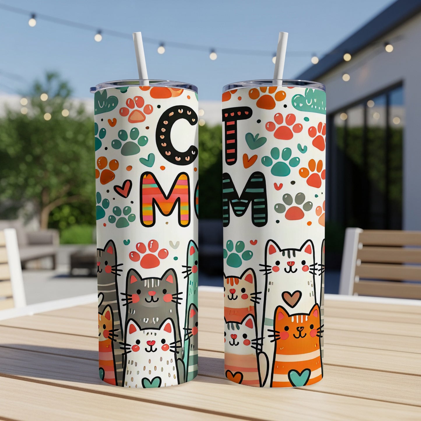 Two tumblers with colorful cat illustrations and "CAT MOM" text.