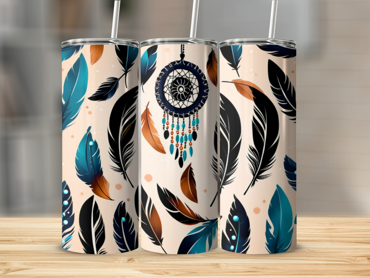 Three tumblers with feathers and a dreamcatcher design.